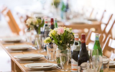 Oak Trestle tables and wooden chairs