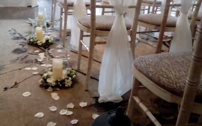 Aisle decor and chair sashes