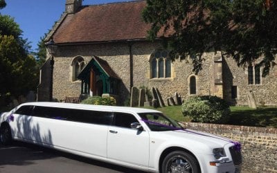 white Chrysler limo wedding