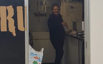 My partner cooking away.