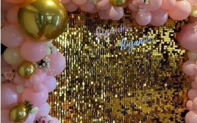 Gold shimmer backdrop pink garland