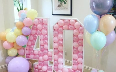 40th 4ft Numbers Filled with Balloons with a side garland and a set of 7.