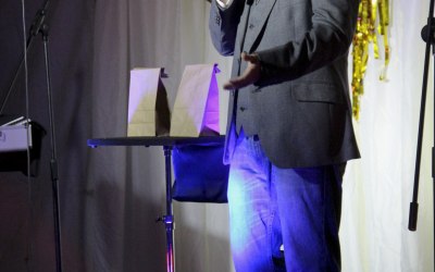 Opening remarks on stage.