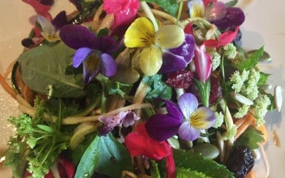 Papaya salad with edible flowers