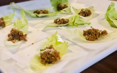 Sesame chicken on salad leaves
