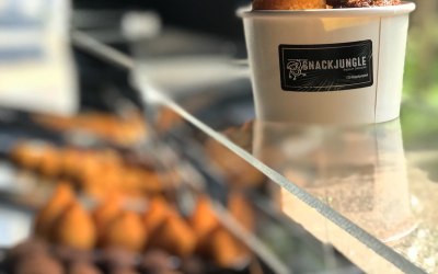 Snackjungle cup filled with a mix of delicious snacks