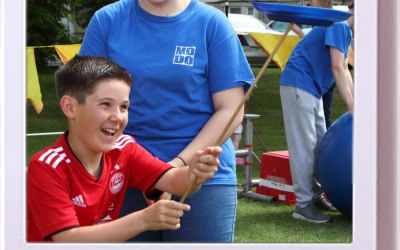 One of our volunteers teaching plate spinning at a local gala!