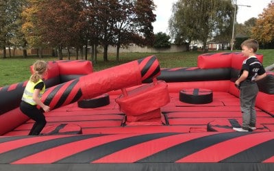 It's a Wipe-out Hire Glasgow:  https://www.splashinflatables.com/category/rodeo-and-simulators#BodyContent