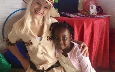 Explorer at animal or dinosaur party
