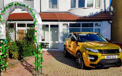 Gold Range Rover Parked