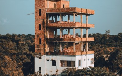 Bangladesh surpises everyone how a bulding can be built in the middle of nowhere. Its beautiful to see the nature and and man made subject peaking through 