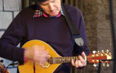 Phil is a multi-instrumentalist and plays the mandolin, mandola and fiddle. He also sings and arranges many of our songs.