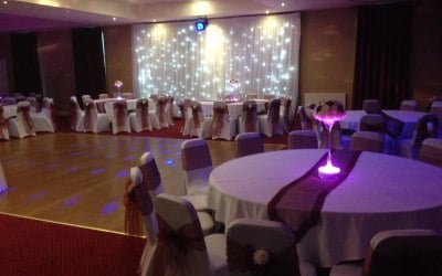 Table Decoration and Backdrop Razzmatazz Occasions