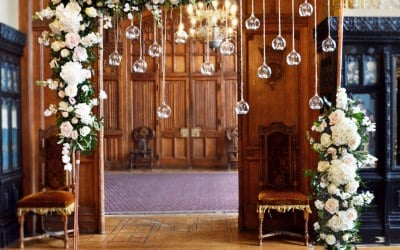 carlton-towers-copper-arch-blush-pink-white-flowers-hanging-candles-copy.jpg