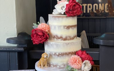 2-tier-semi-naked-with-silk-flowers-and-wooden-topper.jpg