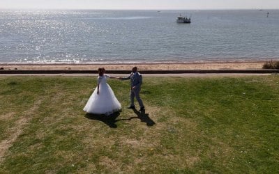 Bride and Groom dancing near the sea