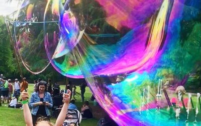 Child makes big bubble!