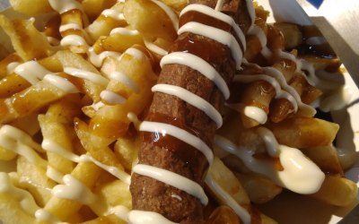 Chips and Frikandel (Dutch sausage) with mayo and curry/ketchup