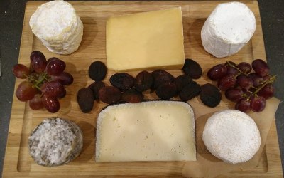Mixed cheeseboard with grapes & apricots
