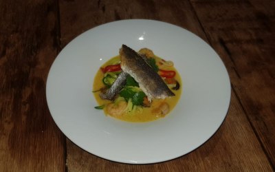 Pan Fried Fillet of Sea Bass on Vegetable Noodles in a Curried Coconut Broth