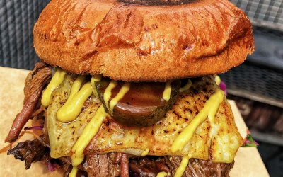 Beef brisket with cheese, pickles and mustard. 
