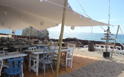 White 10 x 15m stretch tent at a beach wedding