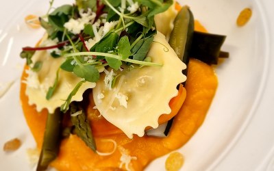 Pumpkin Ravioli, Pumpkin Purée, with Baby Veg and Picklen Raisons 