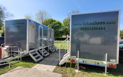 Our 4 bay shower trailers, clean fresh and both less than 2 years old.