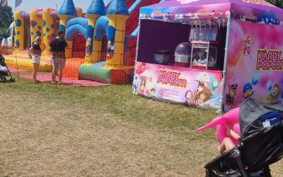 Candy floss, popcorn,  rides and slides available for all events