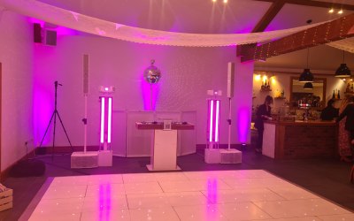 Dancefloor, uplighters and mirrorball completes the look