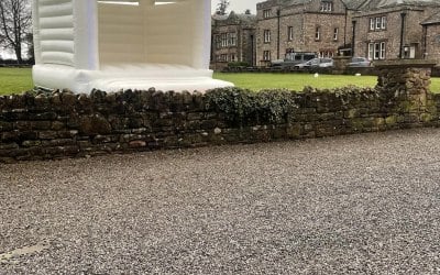 White wedding castle for hire in Cumbria by www.mrbouncescrazycastles.co.uk