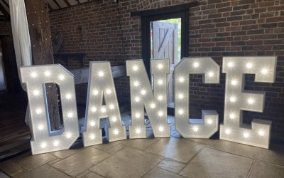 Dance in warm white for a party at Allington Castle 