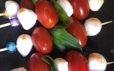 Mozzarella, basil and cherry tomato skewers 