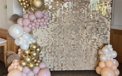 Our glitter gold sequin wall with our 'lets party' neon sign for joint celebrations! An engagement & 60th birthday!