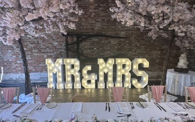 Mr & Mrs in Warm White for a Wedding at Cooling Castle Barn