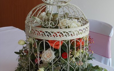 Vintage style birdcage of flowers