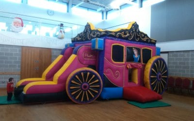 the Princess Carriage bouncy castle and slide