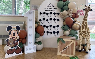 Micky mouse themed balloon decor and backdrop
