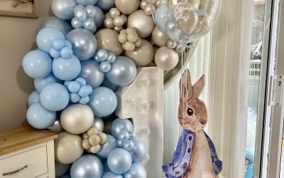 4ft number light with balloon arch, peter rabbit cut out and personalised bubble balloon