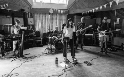 Rehearsal shot of the band.