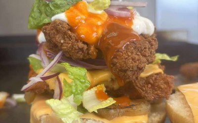 Southern fried chicken burger with hot sauce 