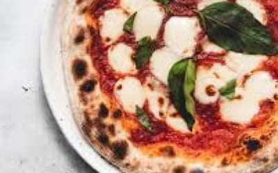 Our signature margarita pizza