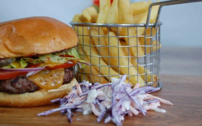 Freshly made BBQ burgers with seasoned fries