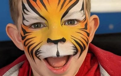 Unforgettable Tiger Face Paint for your child’s Birthday Party.