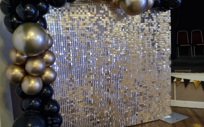 Shimmer wall and balloon garland