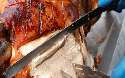 A succulent hog roast being carved