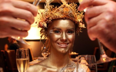 Gold living statue and headdress for restaurant launch