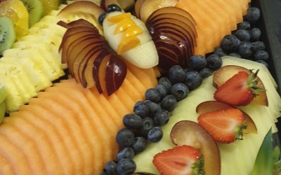 Fresh fruit platter, vanilla bean syrup. Fruit butterfly garnish