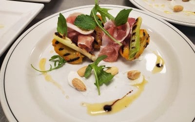 Roasted peach, parma ham & almond salad 