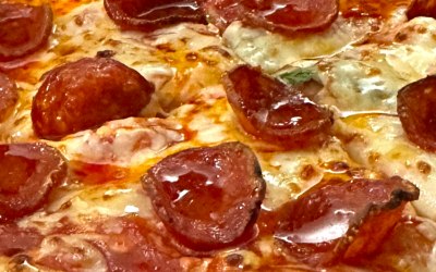 Pepperoni pizza with a drizzle of Hot Honey 